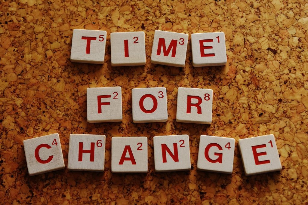 Time for change tiles on cork board